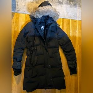 thigh-length Coat. Inside pockets/removable fur ruff. Incredibly warm and comfy.